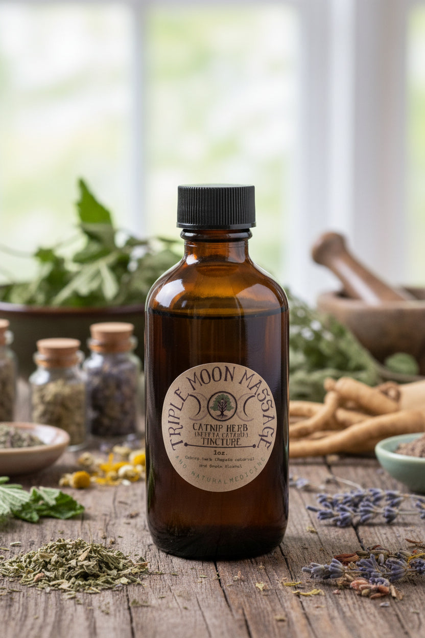 Bottle of Triple Moon Massage Moon Catnip Herb Catnip Tincture on a green background